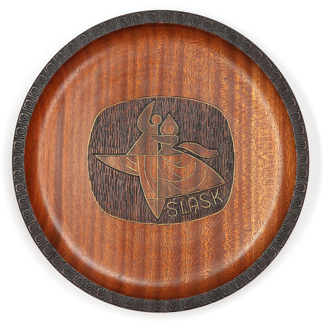 image of an ornamental plate in wood, with metal inlay